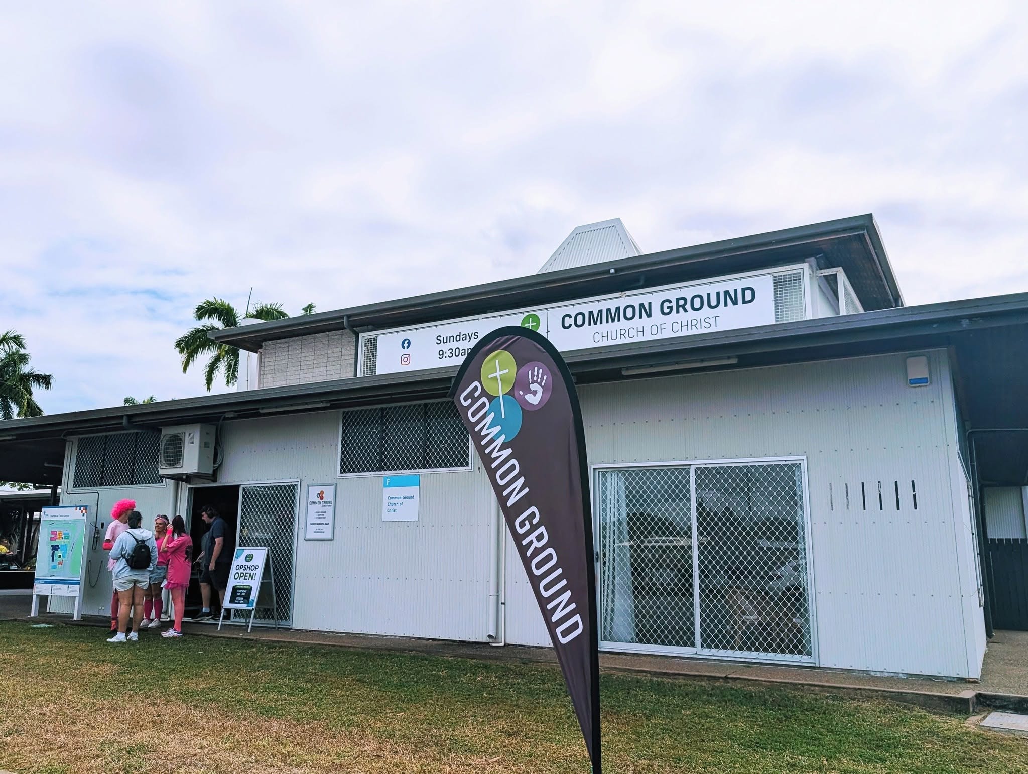 Common Ground Church of Christ with an op shop sign outside the entrance