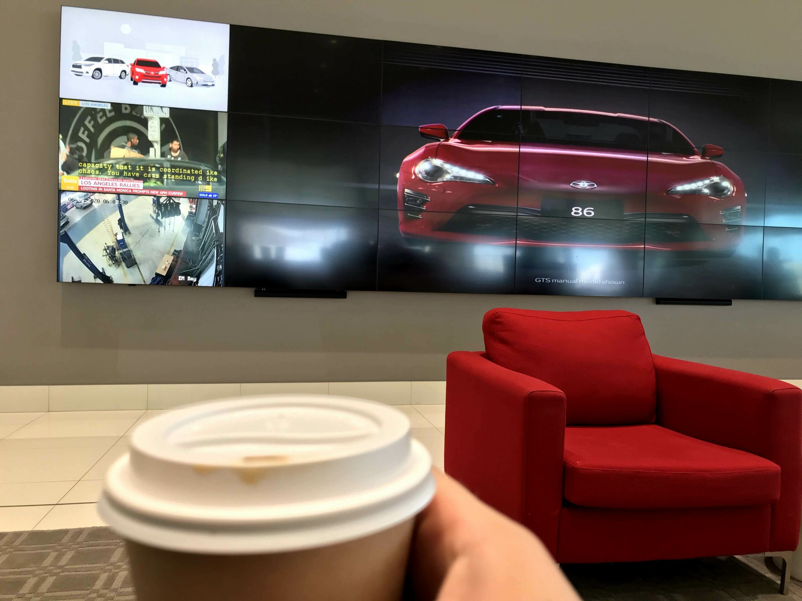 Getting my free coffee and biscuits while getting the work car serviced.
